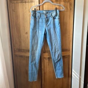 Mid rise skinny jeans. Ankle length